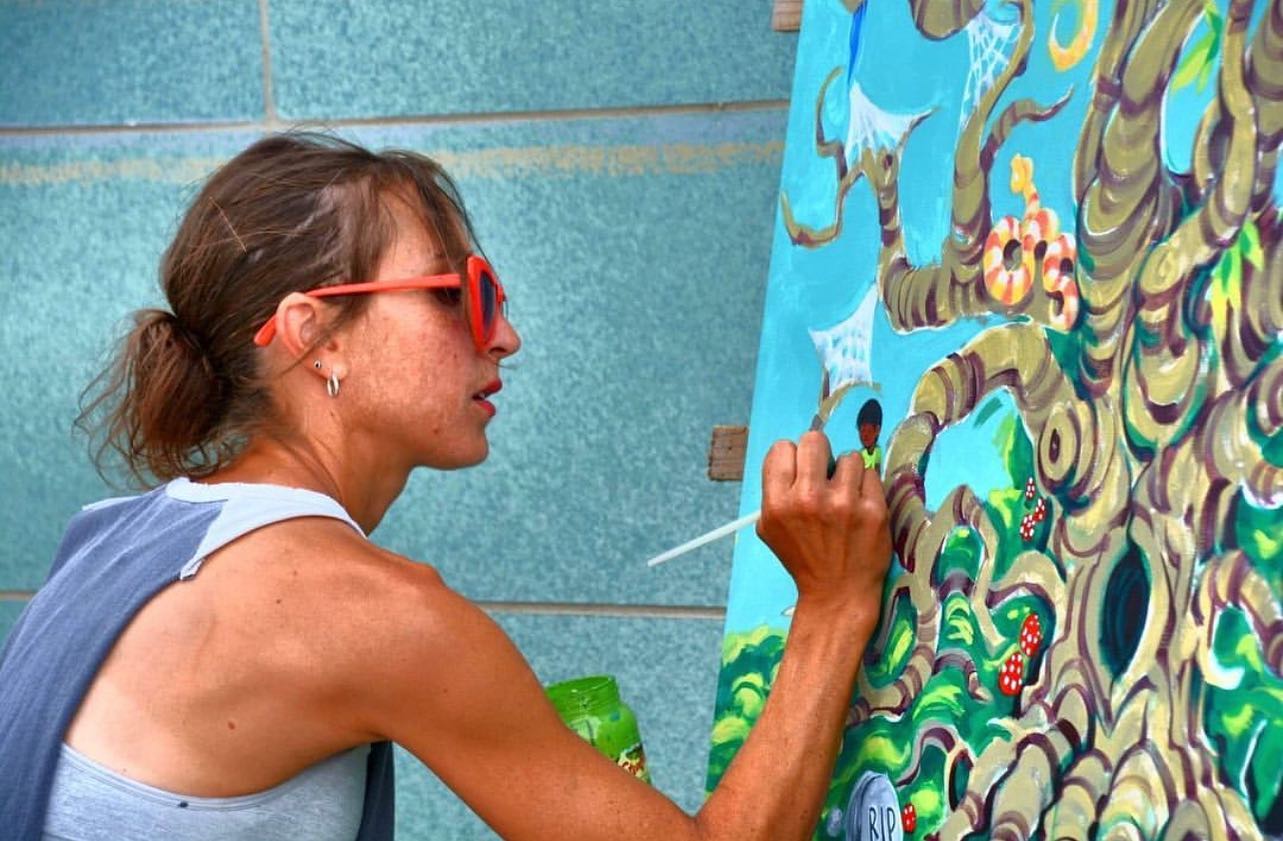 woman painting in the Richland Uptown Shopping Center